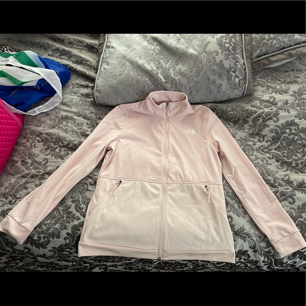 Barely worn North Face fleece lined zip up in light pink